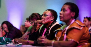 How is economic security linked to violence against women and children?